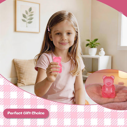Girl holding bear squishy toy slow rising gummy bear fidget sensory play